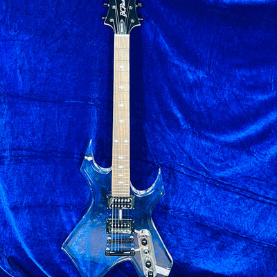 Used B.C.RICH SE WARLOCK ACRYLIC body w/Softcase