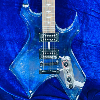 Used B.C.RICH SE WARLOCK ACRYLIC body w/Softcase