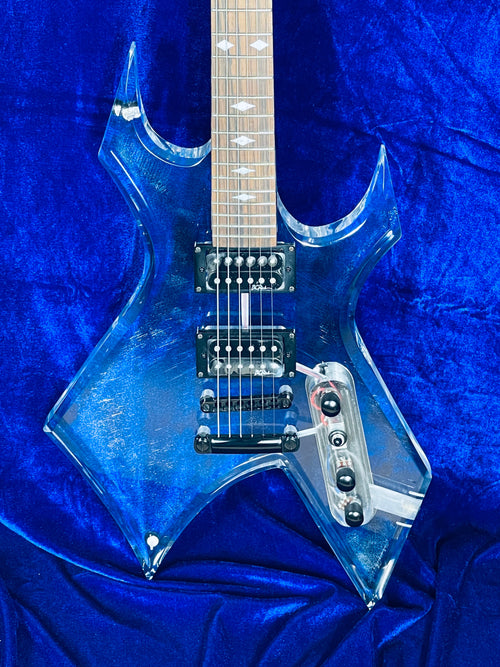 Used B.C.RICH SE WARLOCK ACRYLIC body w/Softcase