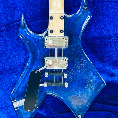 Used B.C.RICH SE WARLOCK ACRYLIC body w/Softcase